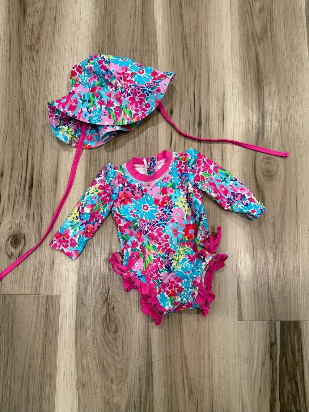 Caden lane swim suit and hat